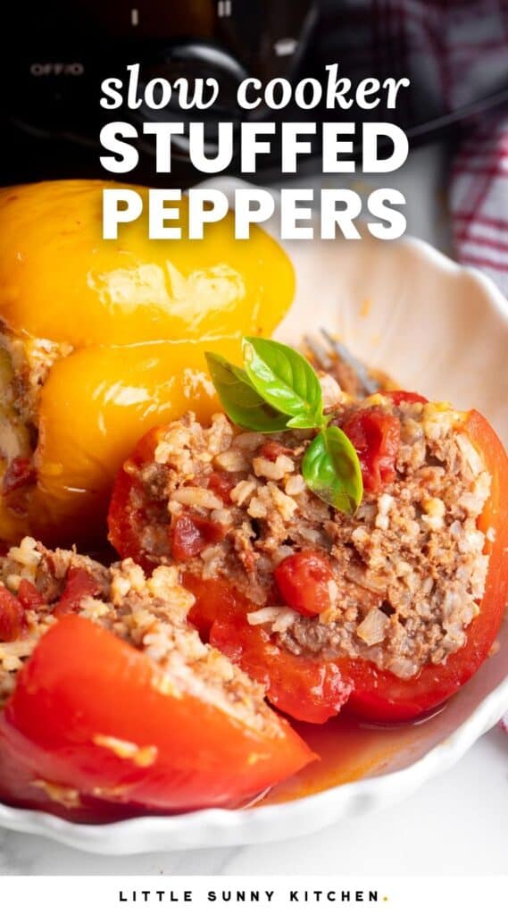 a white ceramic bowl with one yellow and one red stuffed pepper. Text overlay says 